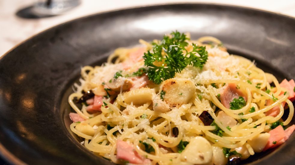 plate of carbonara with smoked salmon